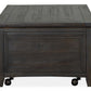 Westley Falls T4399-50: Lift Top Storage Cocktail Table w/Casters